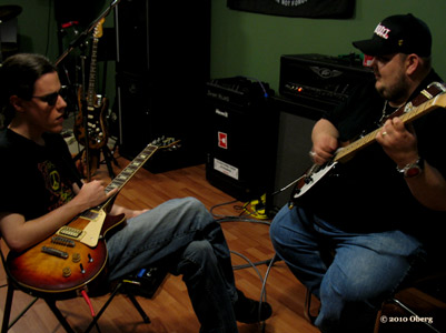 Conrad Oberg playing guitar with Johnny Hiland